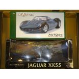 A PAIR OF AUTOART 1:18 SCALE DIECAST MODEL CARS to include a JAGUAR XJ13 (E in VG box) and a