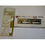 A TOMYTEC N GAUGE JAPANESE OUTLINE 2 PART ARTICULATED TRAM (motorised) together with a motorising