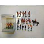 A GROUP OF MODEL SOLDIERS BY BRITAINS to include HRH QEII on horseback and THE MIDDLESEX REGIMENT as
