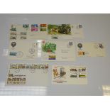 A SMALL QUANTITY OF ROYAL MAIL FIRST DAY COVERS FEATURING DIFFERENT RAILWAY THEMED SETS as