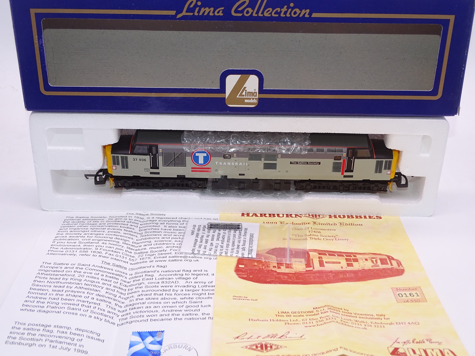 OO GAUGE - A Lima Class 37 diesel locomotive, 37406 The Saltire Society, in Transrail Triple Grey