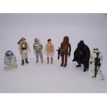 STAR WARS: A group of Star Wars figures to include