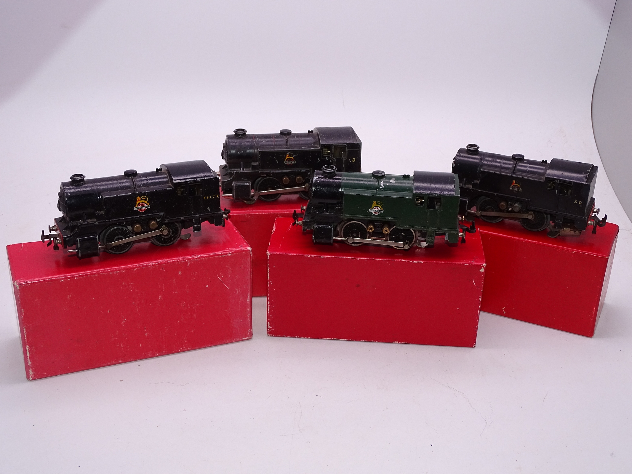 OO Gauge - A group of playworn Trix Twin 0-4-0 steam tank locomotives in various liveries supplied