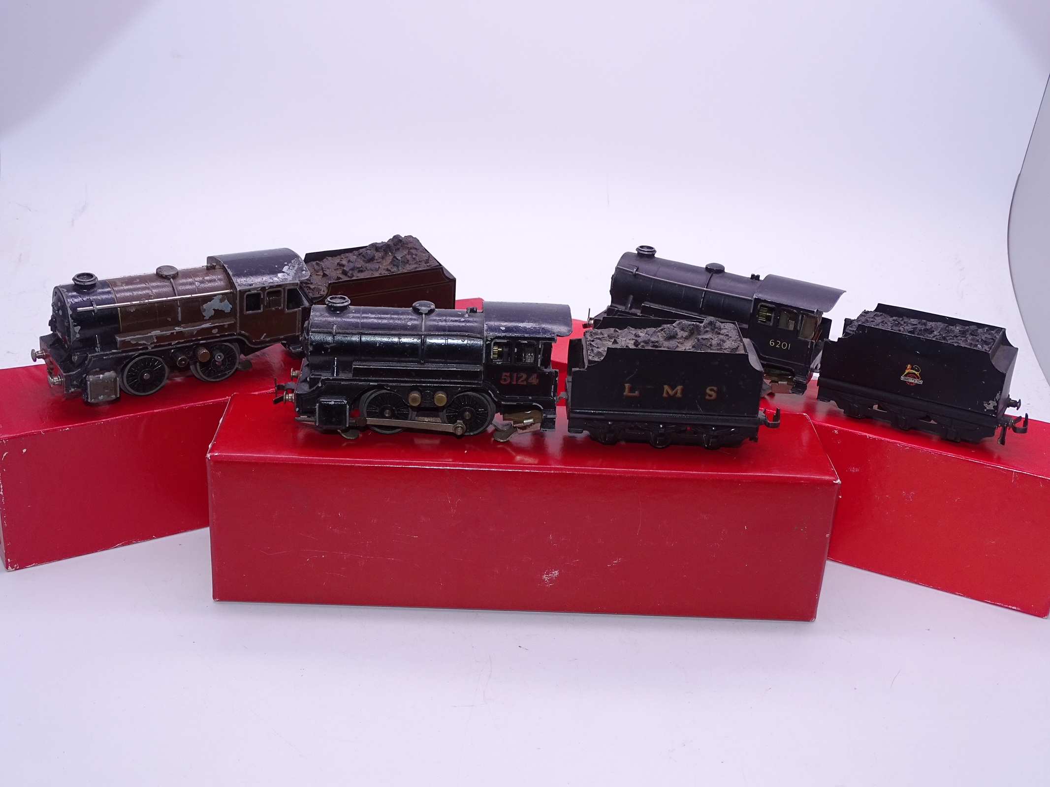 OO Gauge - A group of playworn Trix Twin 0-4-0 steam tender locomotives in various liveries supplied