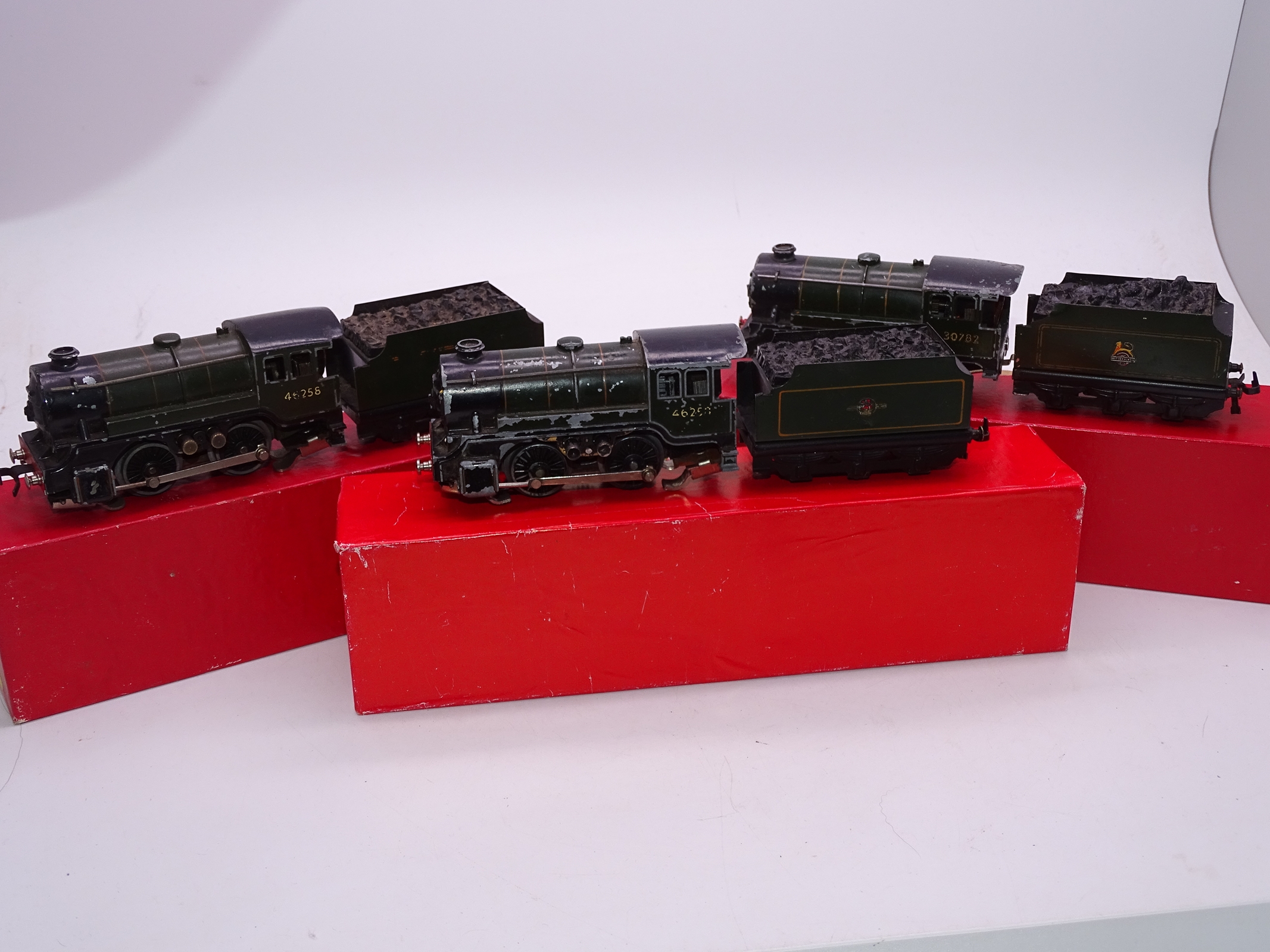 OO Gauge - A group of playworn Trix Twin 0-4-0 steam tender locomotives in various liveries supplied