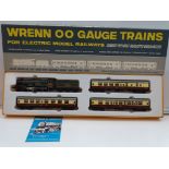 A Wrenn WP100 Pullman Passenger train set (Western Region coaches). VG in G-VG box