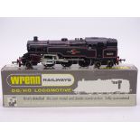 A Wrenn W2218 Class 4MT 2-6-4 standard tank in BR black numbered 80079. VG-E in a VG box (end