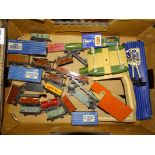 OO Gauge - A quantity of Hornby Dublo tinplate wagons and accessories, mostly unboxed. G, five boxed