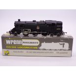 A Wrenn W2307 Class 4MT 2-6-4 standard tank in BR early logo black numbered 80079. VG-E in a VG