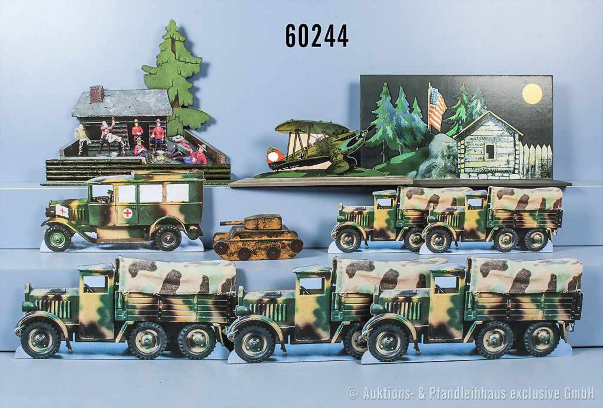 Konv. 8 Dekorationsmodelle, dabei Mannschaftswagen, Sanitätswagen, Panzer, 2 Blockhaushütten sowie
