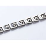 HERMÈS PARIS Bracelet articulé en argent 800 millièmes composé d'une suite de [...]