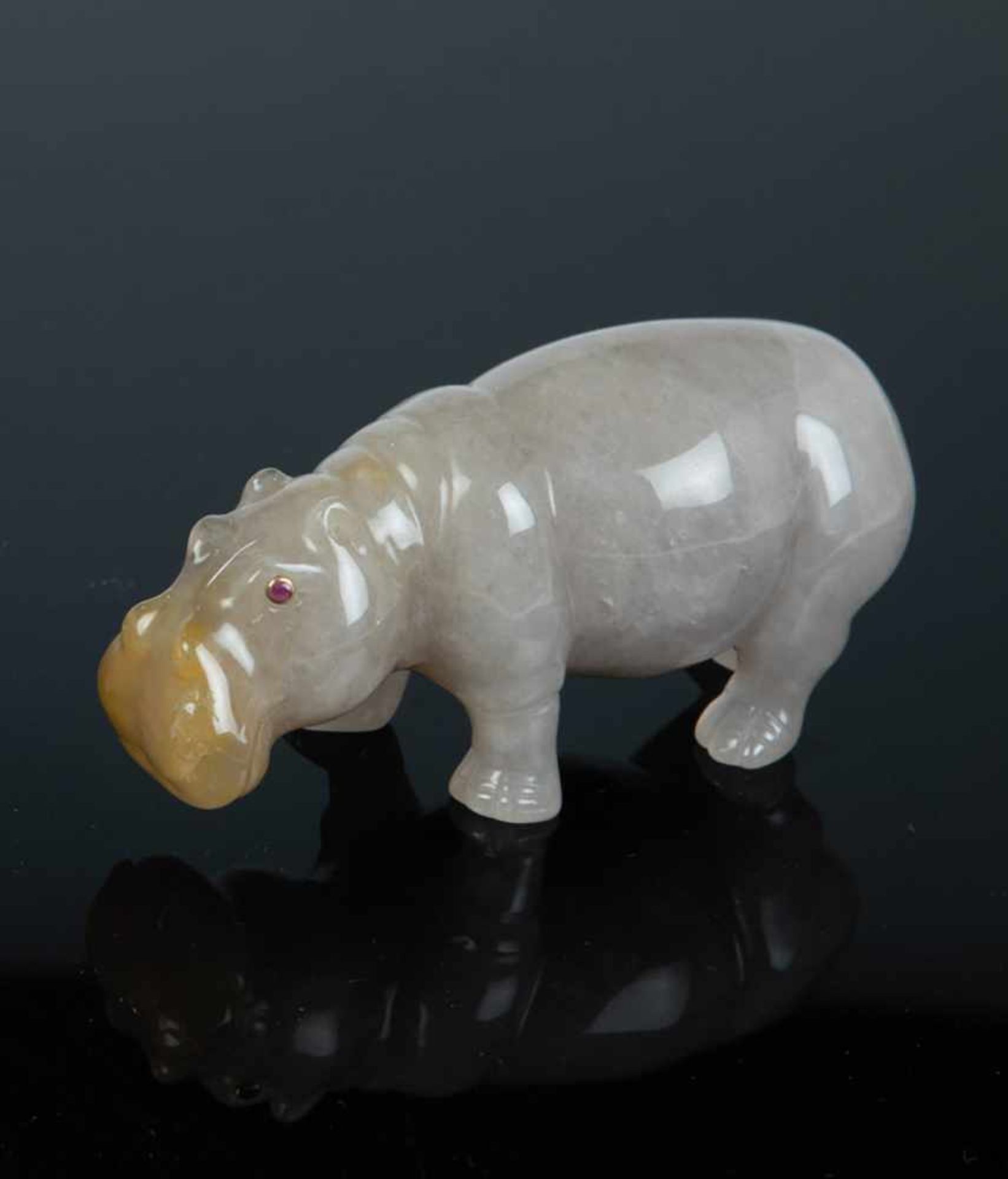 A carved hardstone figure of a hippo. In the manner of Fabergé, 2nd half of the 20thcentury.