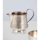 A silver jug. Russia, Moscow, I. Raspopov, 1888. Engraved body. Bottom stamped withhallmark, 84-