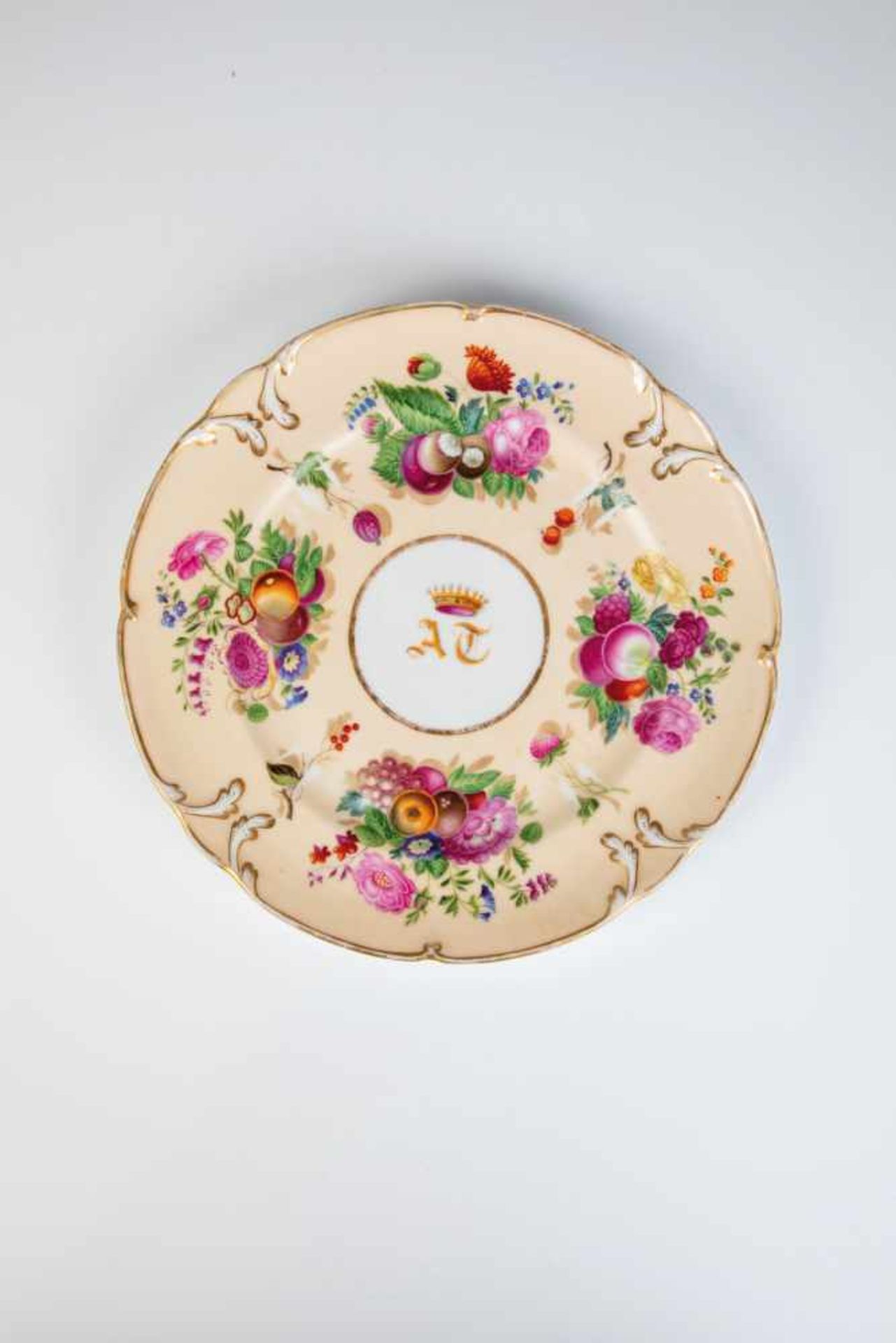 A porcelain plate with monogram. Moscow, Popoff porcelain manufactory, circa 1850.Polychrome