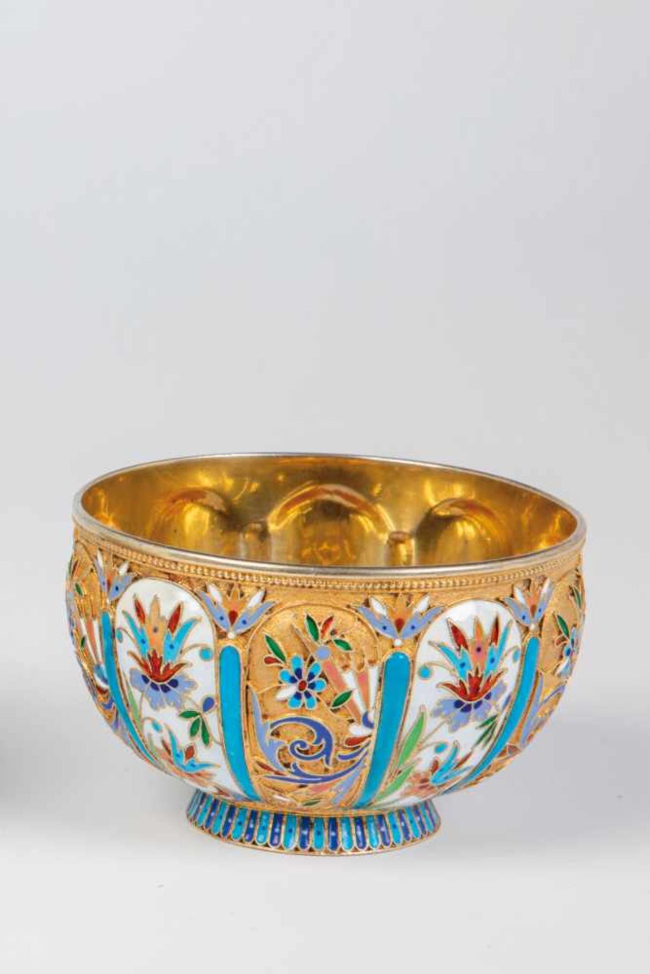 A silver-gilt and cloisonné enamel bowl. Russia, Moscow, Nikolai Alekseev, circa 1890.Round stand.