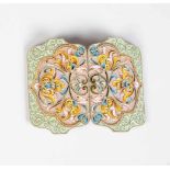 A silver-gilt and cloisonne enamel belt buckle. Russia, circa 1880. Finely decorated