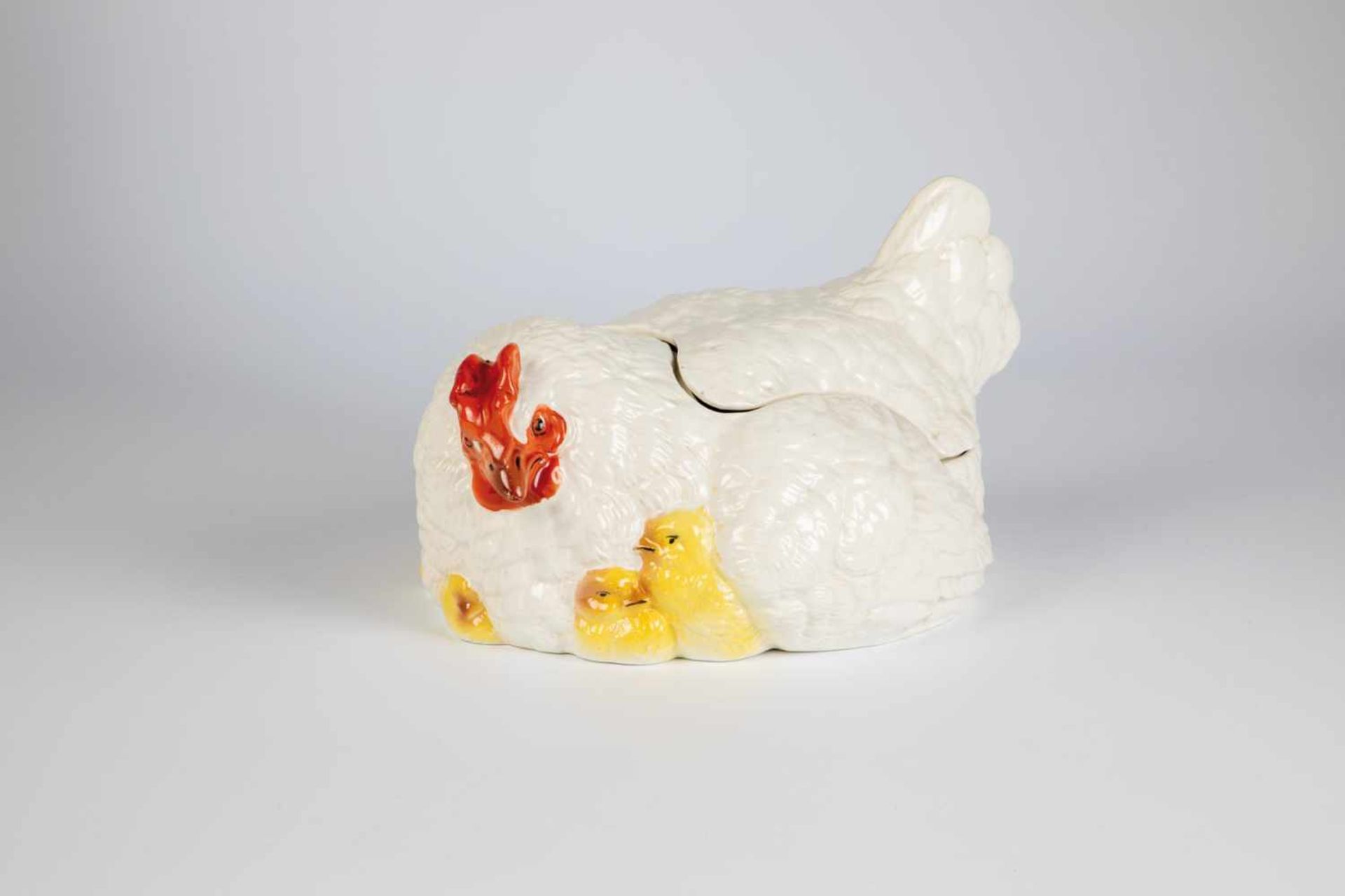 A Russian porcelain hen form butter dish. Tver, M.S. Kuznetsov Factory, circa 1870-1889.Breeding hen