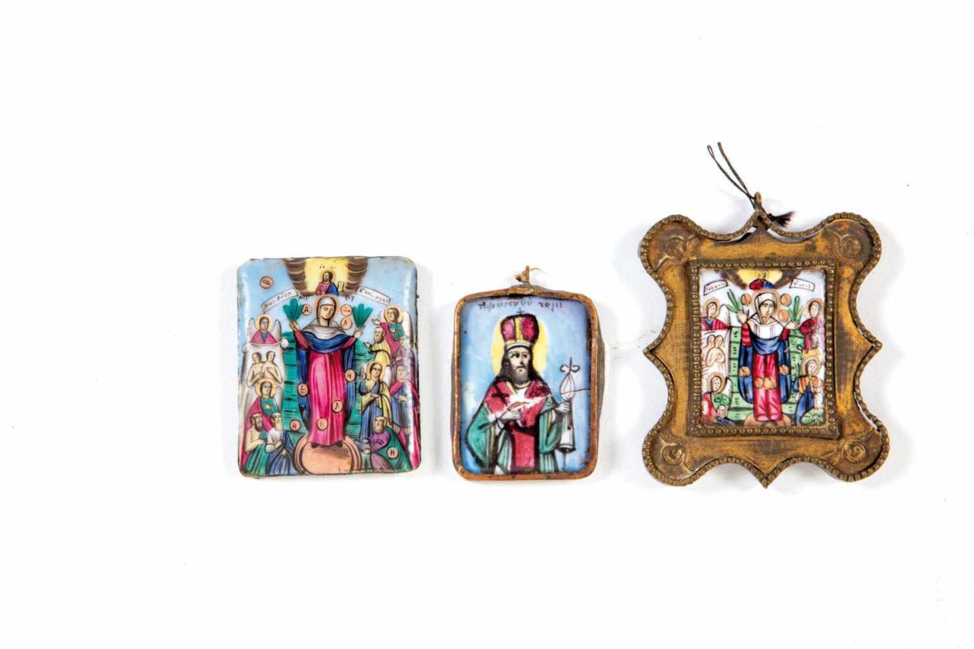 Three finift icons. Rostov, late 19th century. Enamel over chopper, two with brassmounting, two with