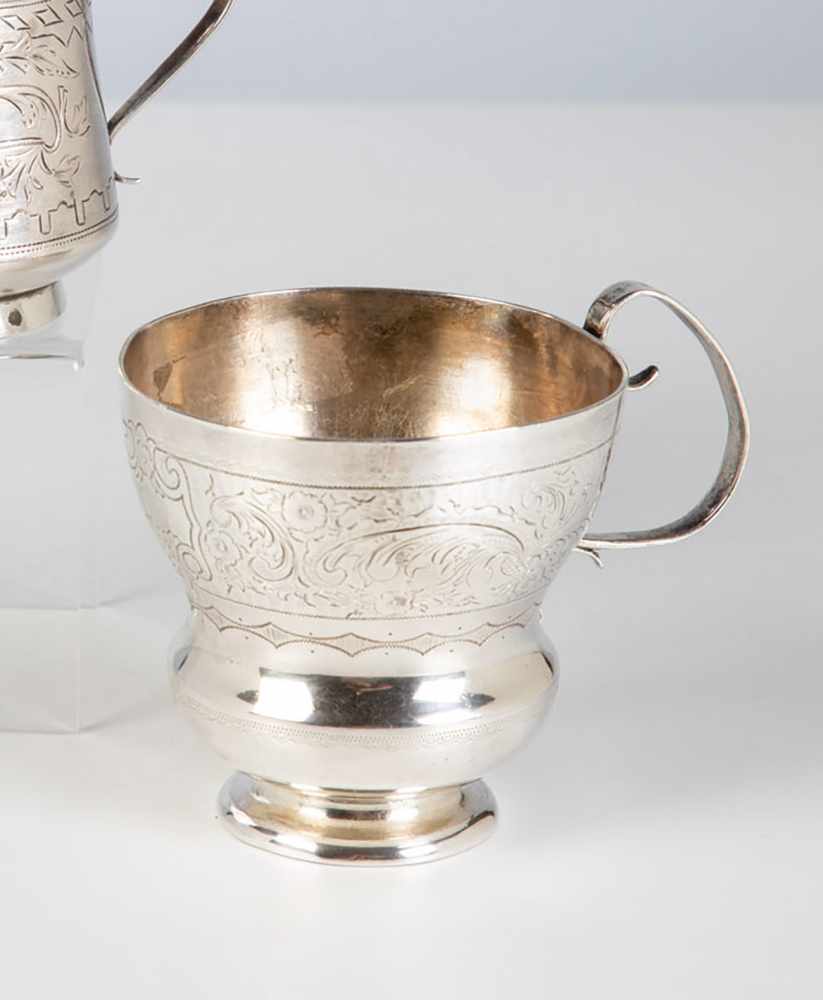 A silver beaker. Russia, Moscow, 1869. Engraved decor. Stamped with hallmark, 84-standard,assayer'