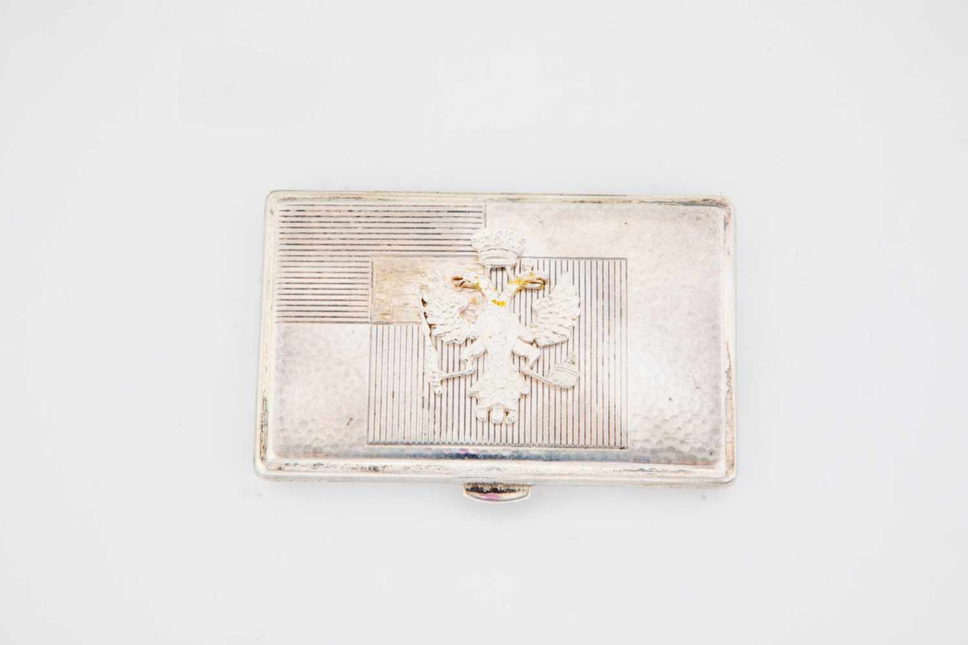 A silver case with double headed eagle. Early 20th century. Gilt interior. Hinged lid withpartial