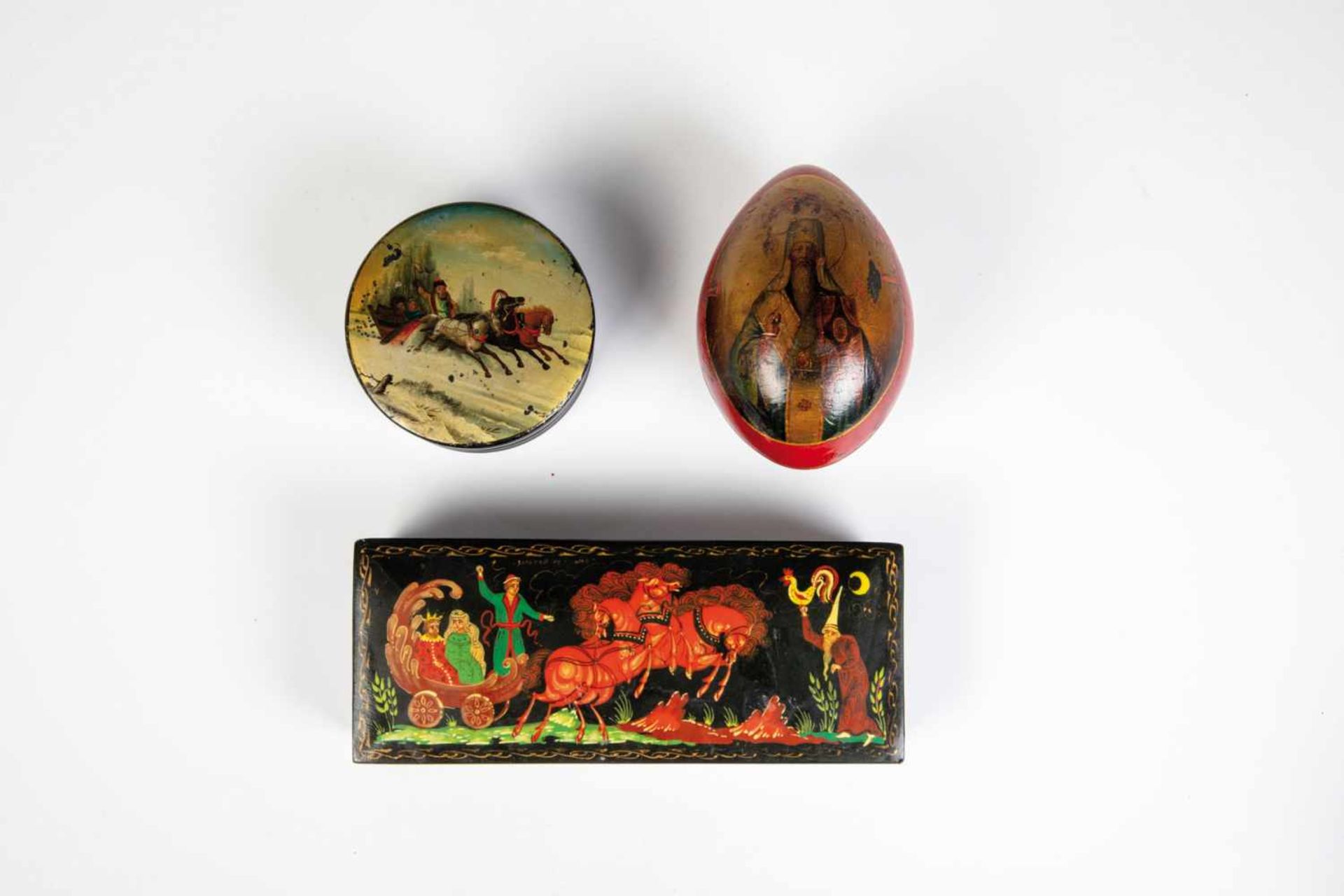 Two papier-mache and lacquer boxes and one egg. Russia, late 19th century (two) / late20th