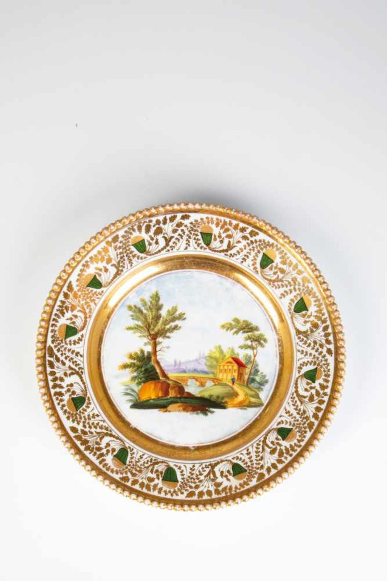 Porcelain plate. Moscow, Popoff, circa 1850. Polychrome overglaze painting: a house inlandscape,