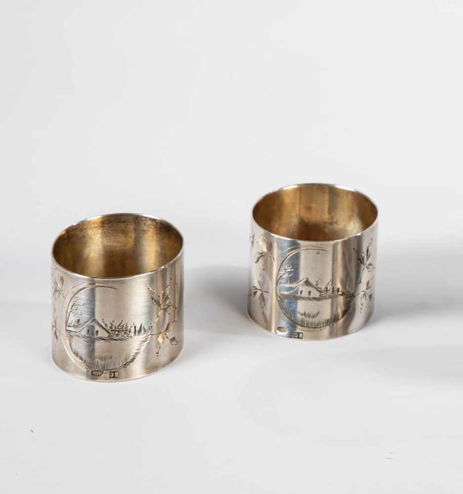 Two silver napkins. Russia, Moscow, Ivan Saltykow, 1896-1908. Gilt interior. Engravedhouses and