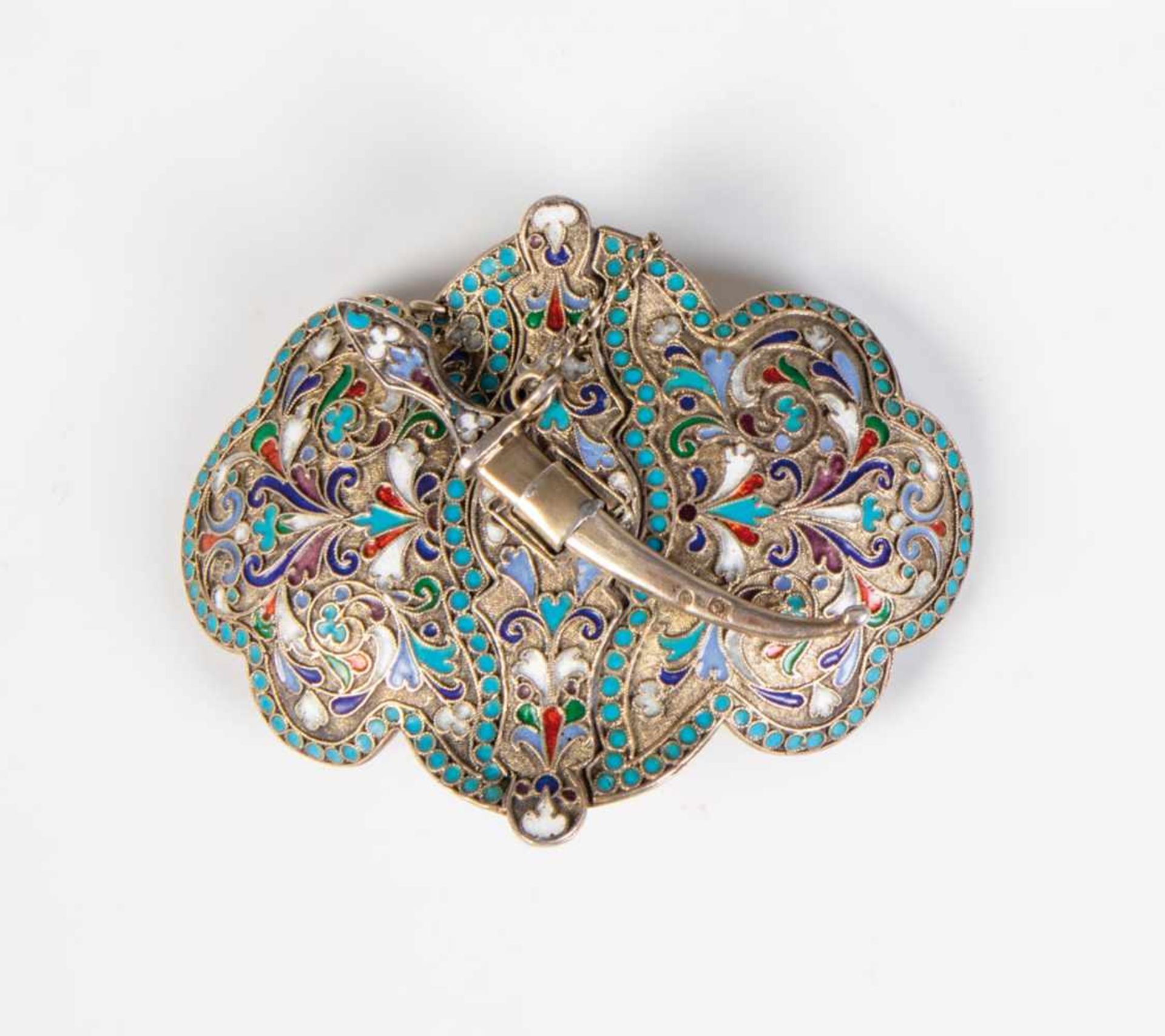 A silver-gilt and cloisonné-enamel belt buckle. Russia, Moscow, 1896-1908. Body withstylized