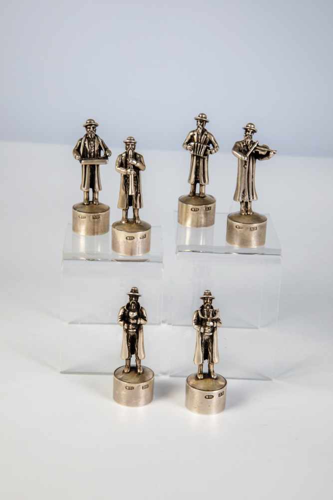 Six silver jew figures. 20th century. Six realistically carved jews making music. Bearingspurious