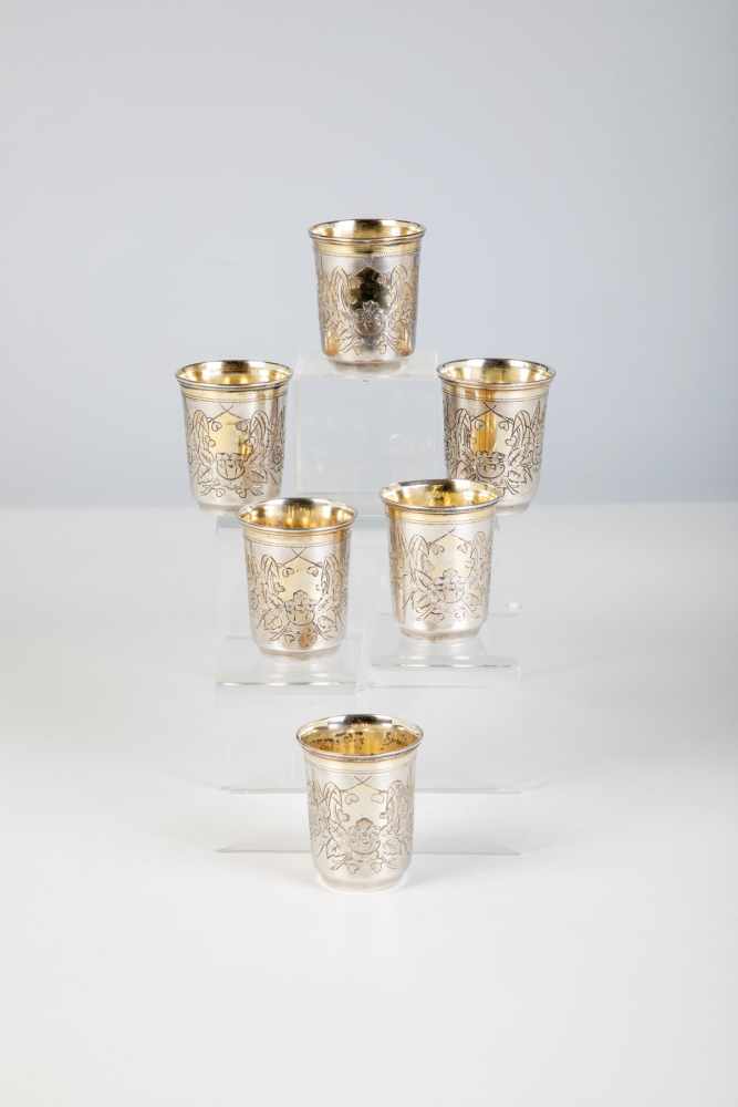 Six silver-gilt vodka beaker. Kiev, 1893. Gilt inside and lip. Engraved flowers. Bottomwith