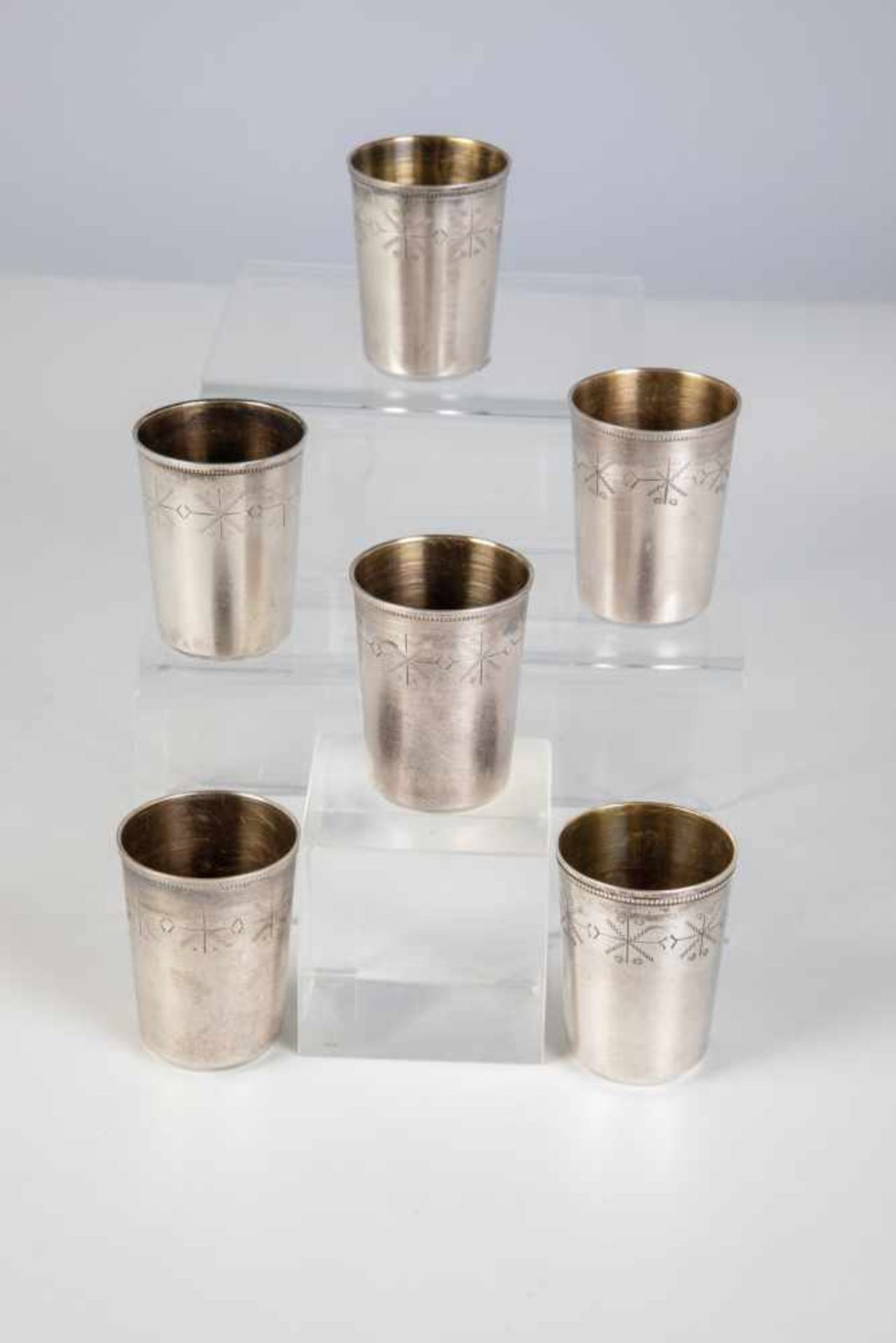 Six silver vodka beaker. Soviet Union, Tallinn, 1954-1991. Gilt interior. Engraved decor.Stamped