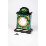 A malachite table clock. 20th century. Malachite with applied silver-gilt foliage set with14 pearls.