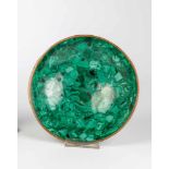 A malachite bowl. 20th century. Round malachite bowl with bronze-painted border. Diam.19.5 cm.