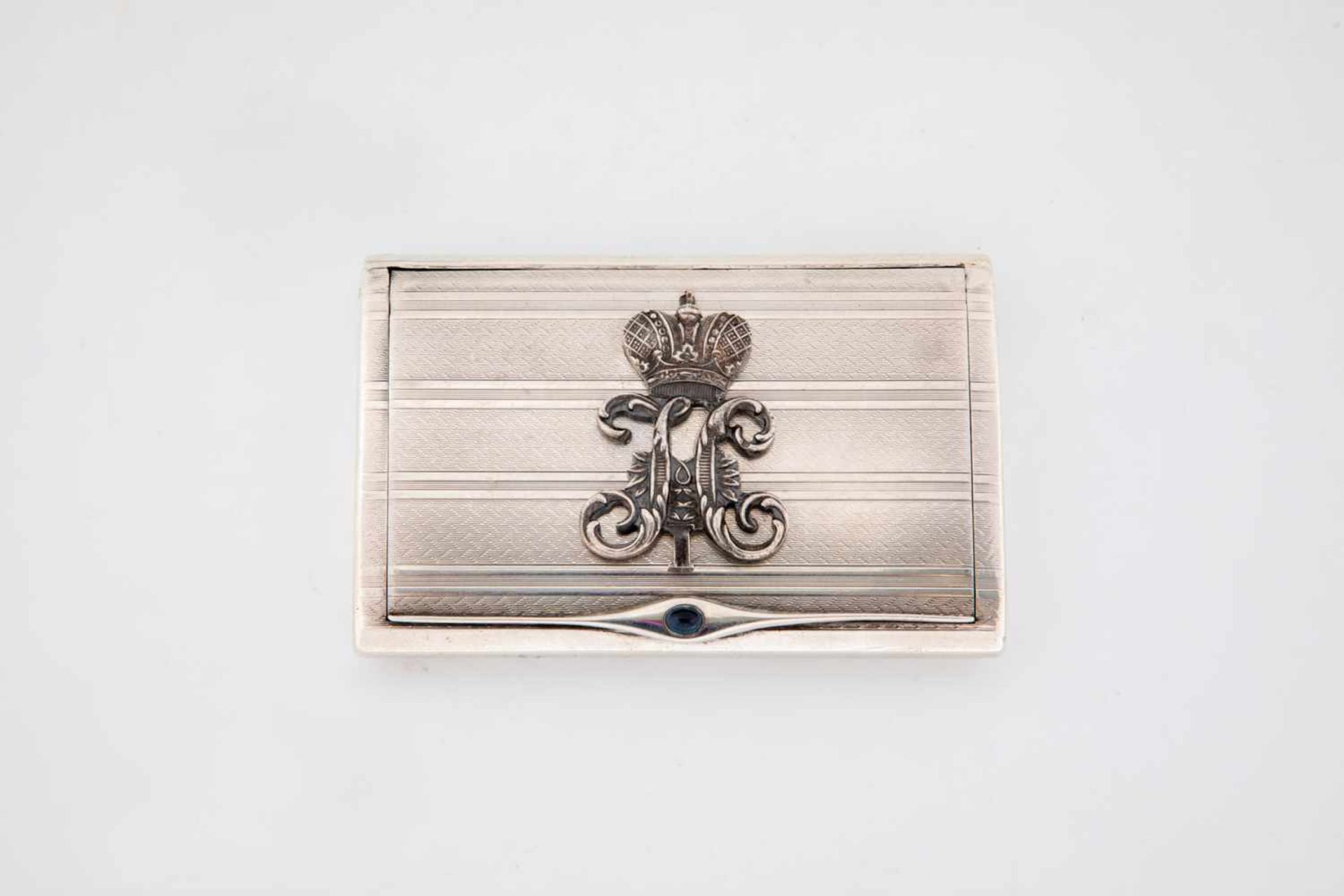 A silver case with monogram Nicholas I. Early 20th century. Gilt interior. Guillocheddecor all-