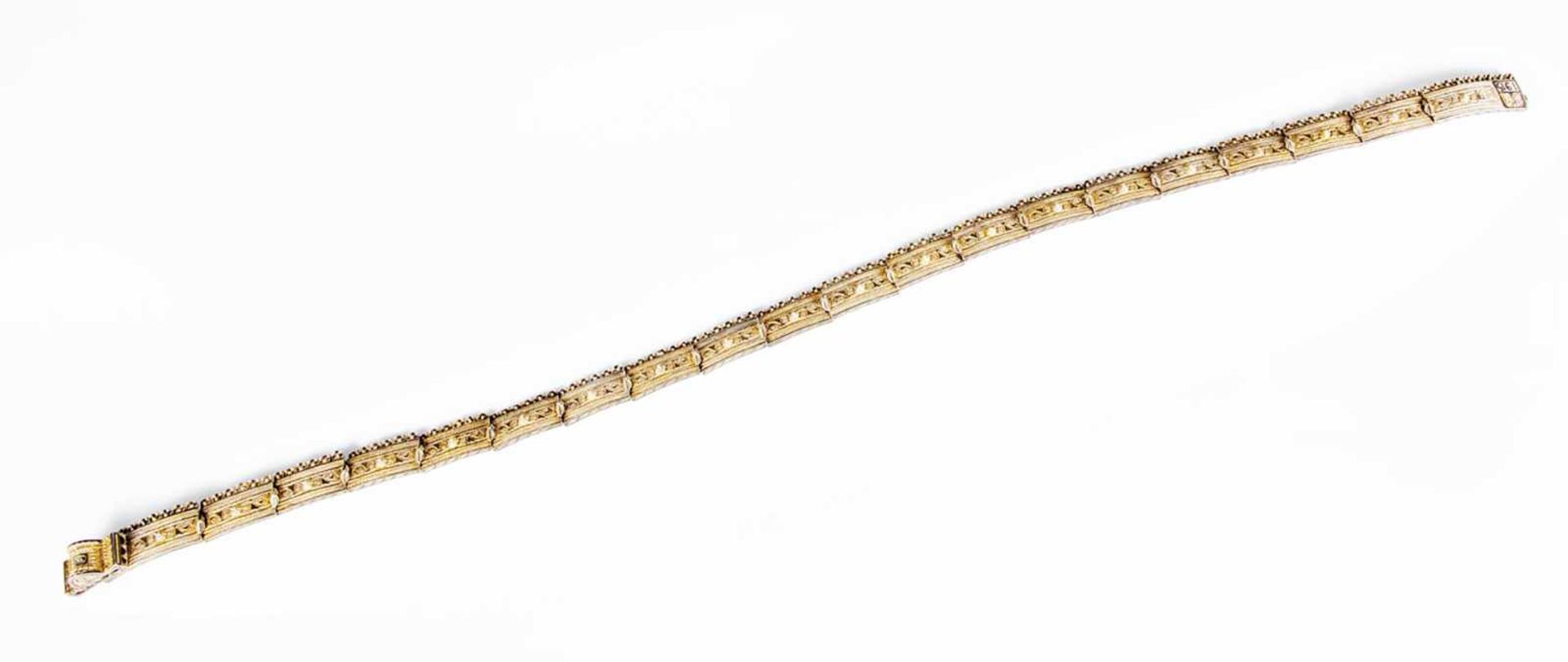 A silver-gilt and niello belt. Caucasian, 1908-1917. 20 chains, cloth band. Stamped withassayer's