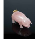 A naturalistic carved rose quartz pig. In the manner of Fabergé, 2nd half of the 20thcentury.