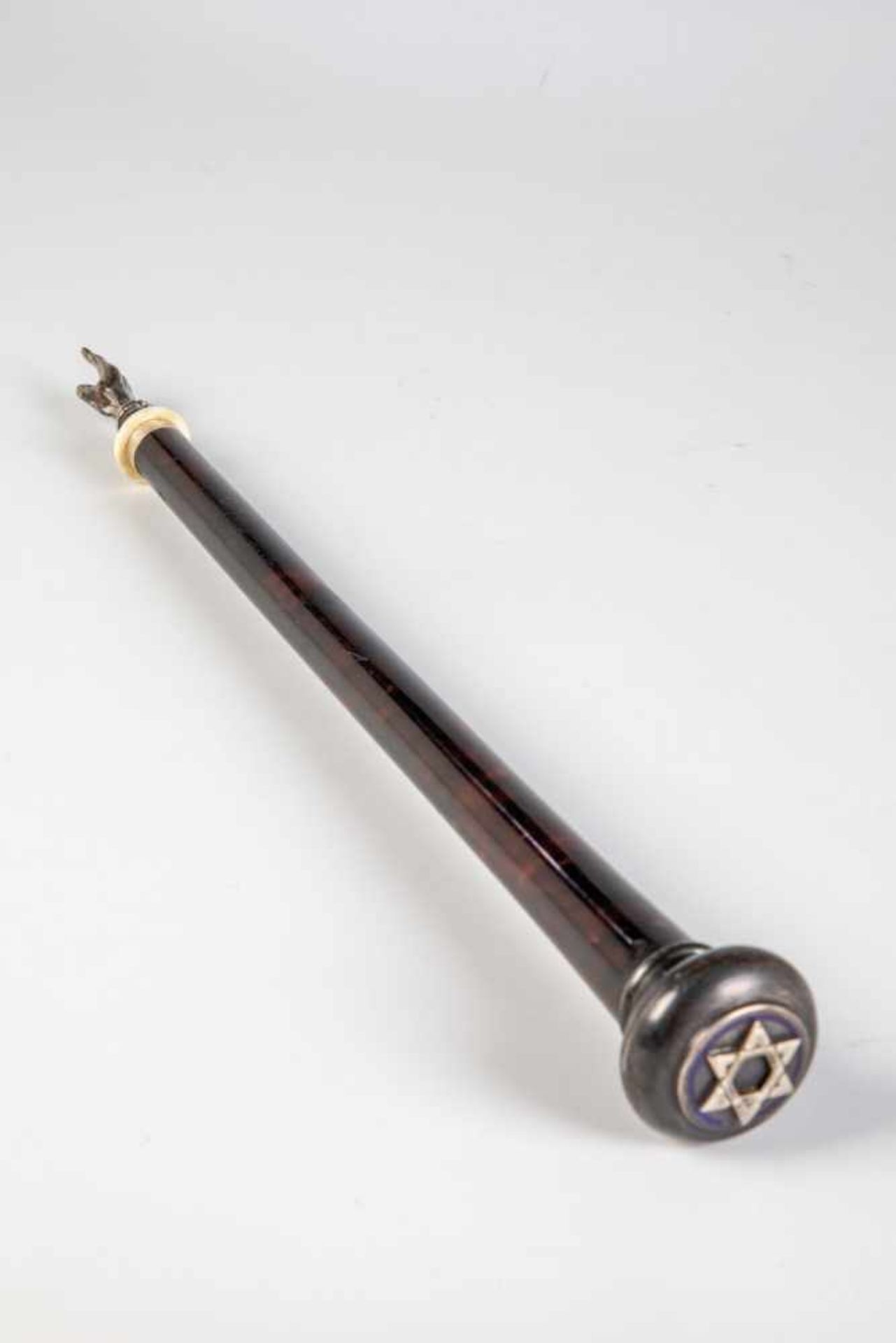 A tortoise shell and silver torah pointer. Early 20th century. Tortoise shell handle.Pointer and end