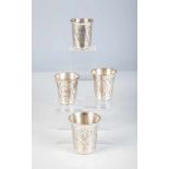 Four silver beakers. Russia, 1868 (one), 1896-1908 (two), 1908-1917 (one). All withengraved decor.