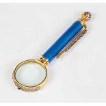 A silver-gilt and guilloche-enamel magnifier set with diamond roses. 2nd half of the 20thcentury.