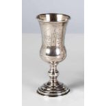 A silver beaker. Kiev, circa 1900. Gilt interior. Engraved houses and flowers. Stampedwith