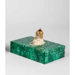 A malachite box with bogatyr. 20th century. Rectangular malachite box. Hinged lid withapplied silver