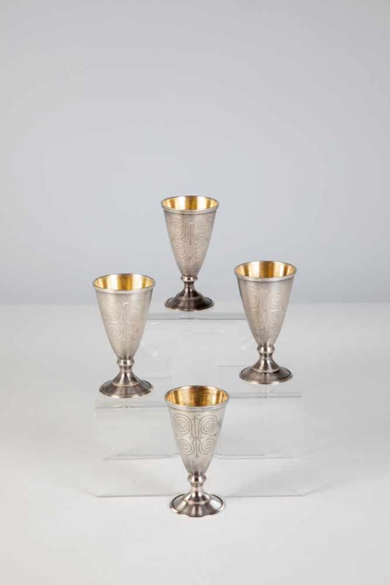 Four silver partial-gilt vodka beakers. Soviet Union, after 1958. Soviet assyer's markwith 916-