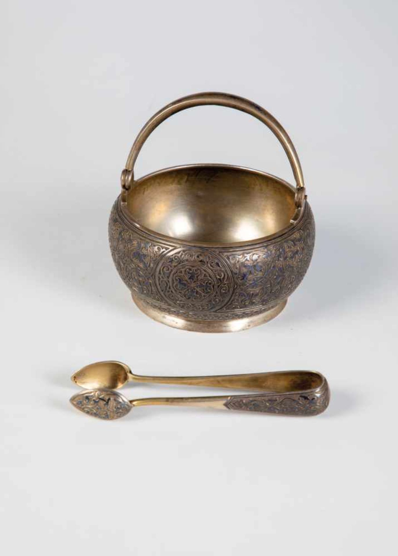 A silver and niello sugar bowl and tong. Russia, Moscow, Maria Sokolova, 1896-1908. Bowland tong