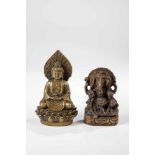 Two statuettes. China / India, 20th century. Buddha Amitabha with sun wheel on the chestand