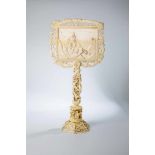 F. WittigMunich, dated 1857 Ivory lampshade. Pedestal zone as well as border fully carved. The