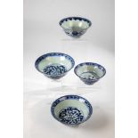 Four bowls. China, Tao Kuang period, 1st half of the 19th century. With blue floral decor.On the