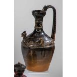 Jug. Asia, probably 19th century. Long-necked jug with dragon and henna decoration. Walldecorated