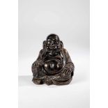 Budai. China, 21st century. Laughing Buddha, sitting. Ceramics. 18.5 x 16 x 14.5 cm.BudaiChina,