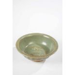 Celadon bowl. China, probably Ming Dynasty 16th century. Bell-shaped, ribbed wall on astanding