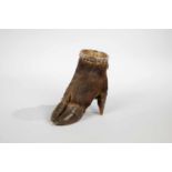 A silver mounted hooves beaker. 19th century. Hooves with silver-gilt beaker inlay. 11 cmhigh.Becher